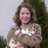 Molly A. Shane with her cat. Links to her story